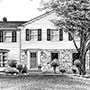 Pen and Ink Drawing of Stone-and-Siding Home